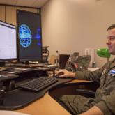 Capt. Kevin Thurber of the 315th Airlift Wing at Joint Base Charleston, S.C., uses the Puckboard software program to schedule C-17 aircrews.